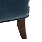 Poltrona a pozzetto in similpelle vegana di transizione con borchie decorative