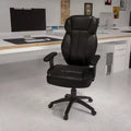 Sedia da ufficio ergonomica multifunzione in pelle Soft nera con schienale alto e supporto lombare